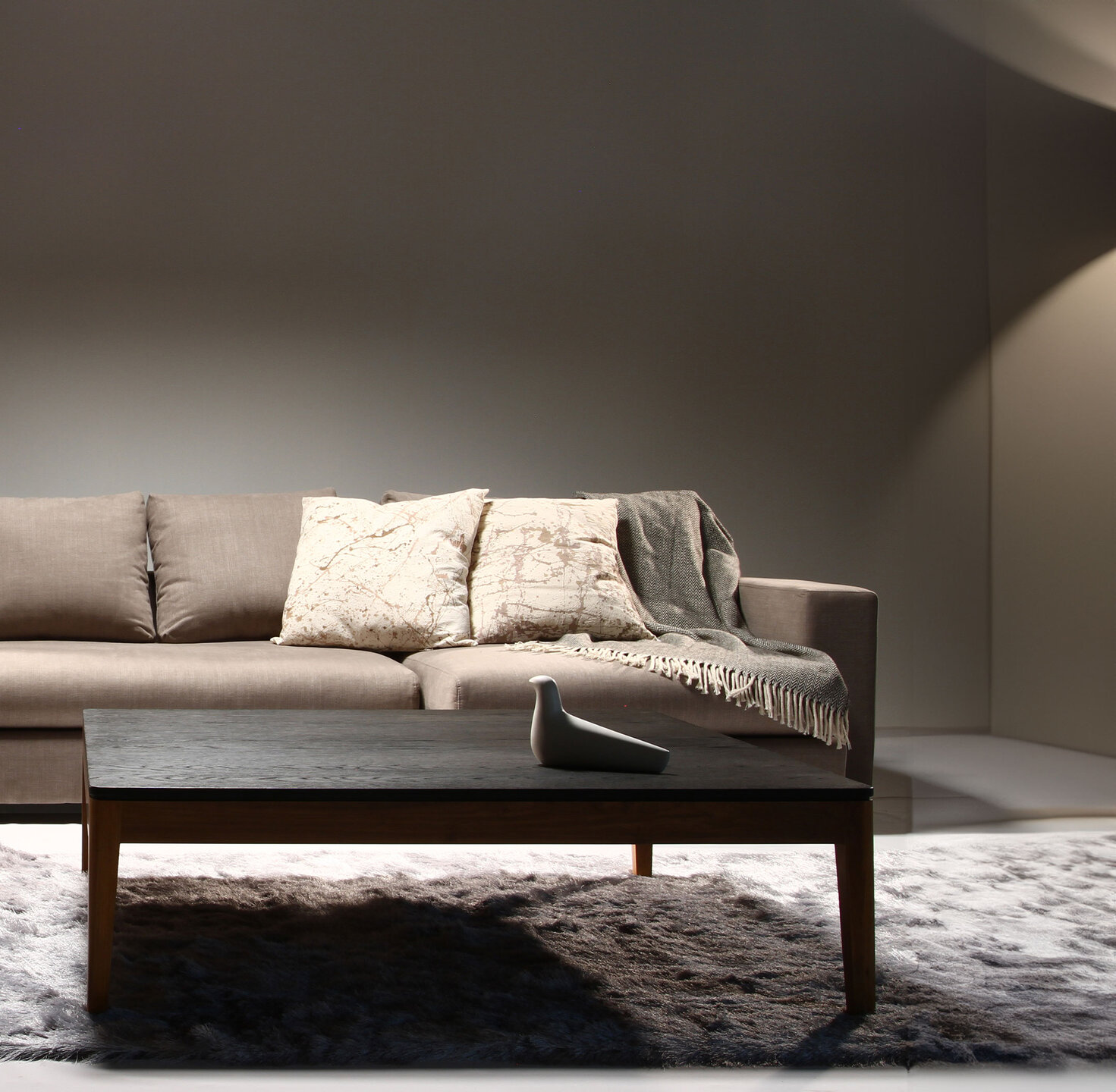 Brown, Furniture, Living room, Daybed, Couch, Hardwood, Design, Wood stain, Throw pillow, Coffee table