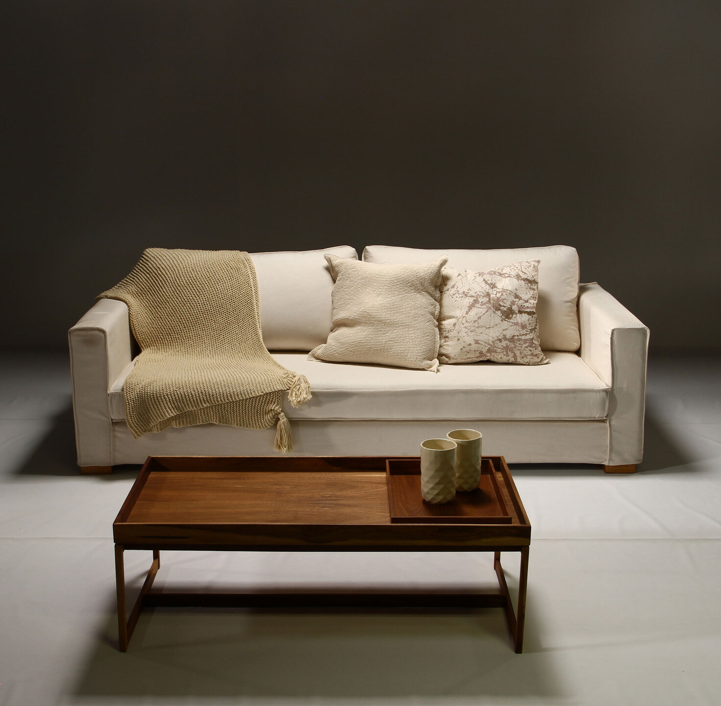 Couch, Wood, Furniture, Living room, Brown, Flooring, Daybed, Floor, Cushion, Throw pillow