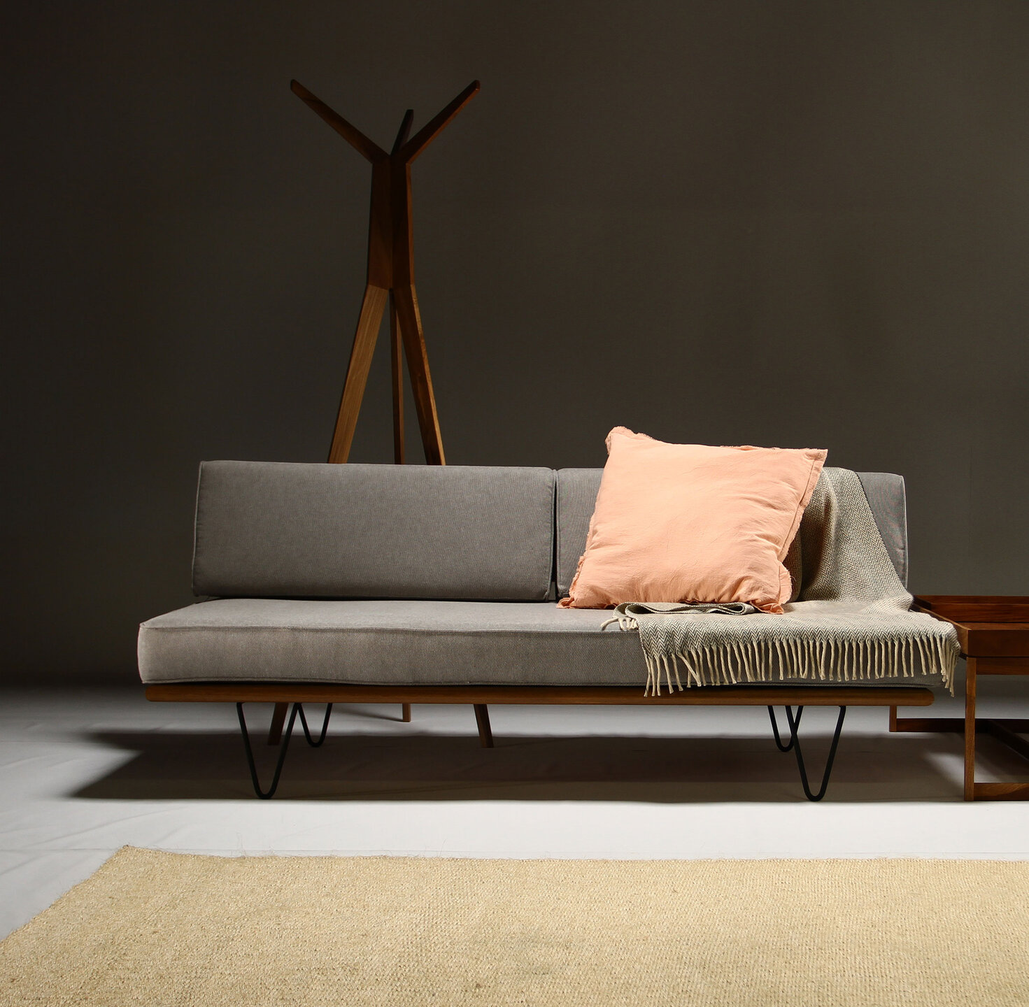 Furniture, Couch, Living room, Natural material, Daybed, Design, Wood stain, Hardwood, Sofa bed